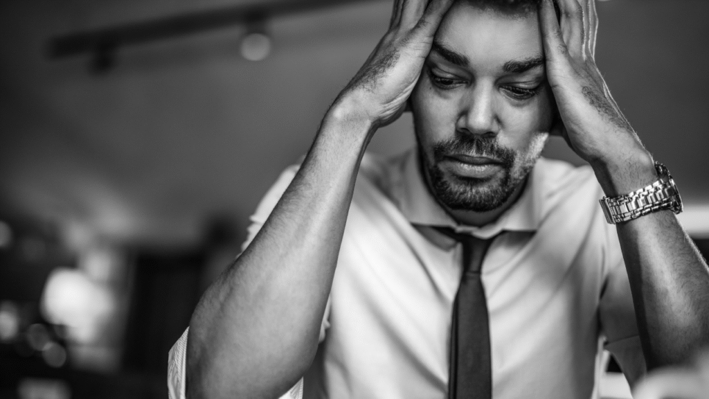 Male healthcare worker reflecting men’s mental health he is depressed
