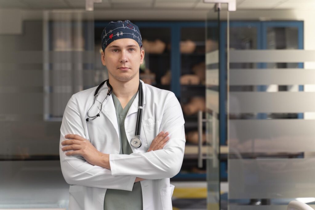 allied healthcare staffing - white male nurse in a clinic hall